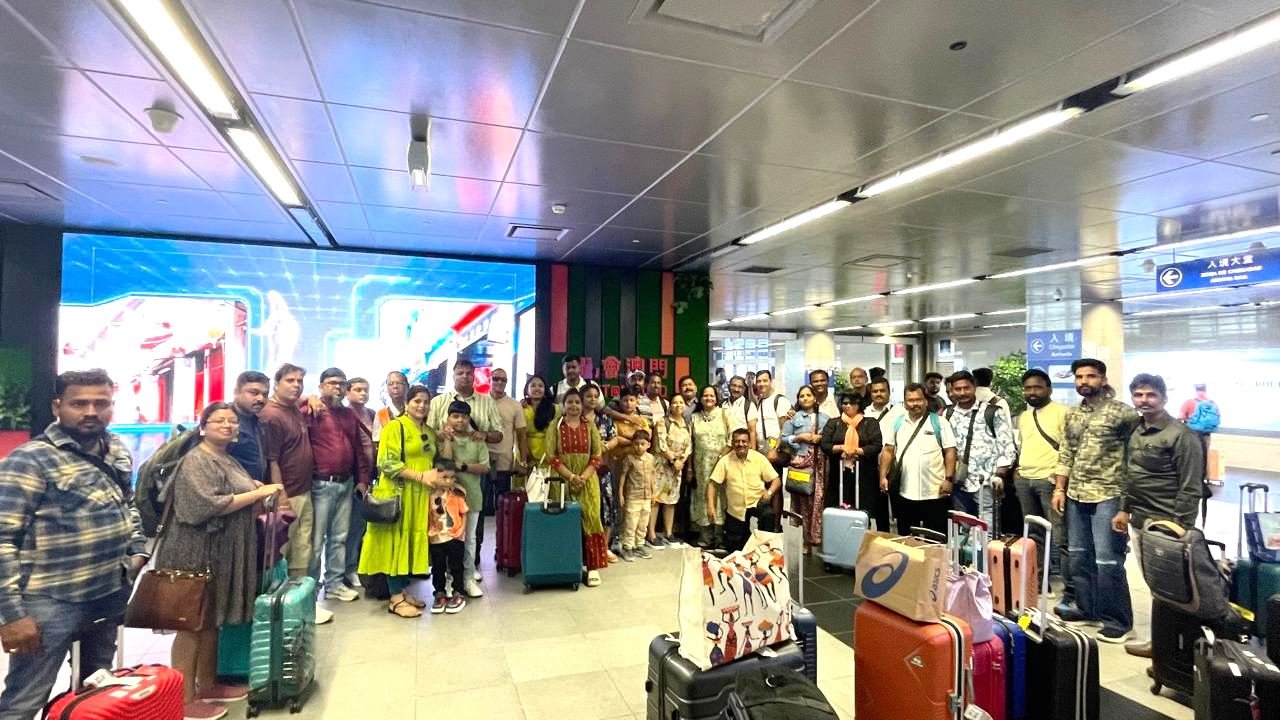 Client incentive trip group at an airport departure hall