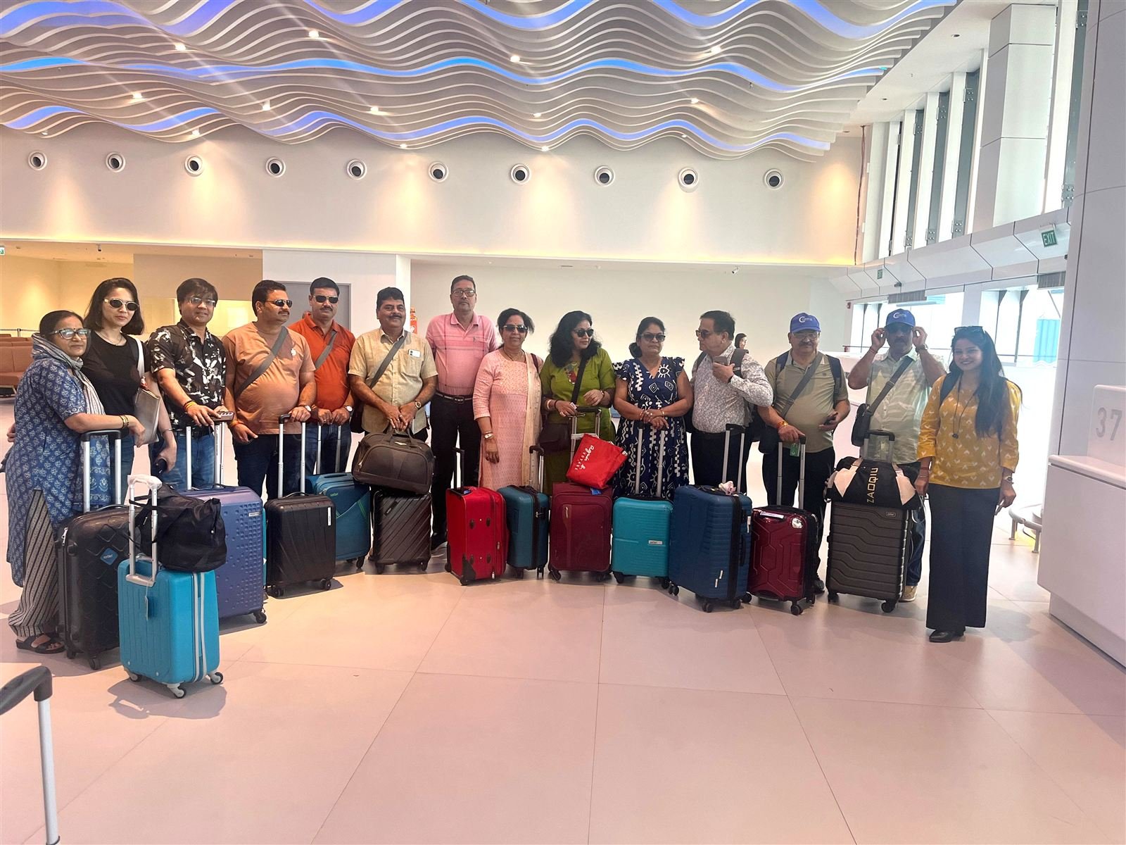 Client incentive trip group in an airport lobby